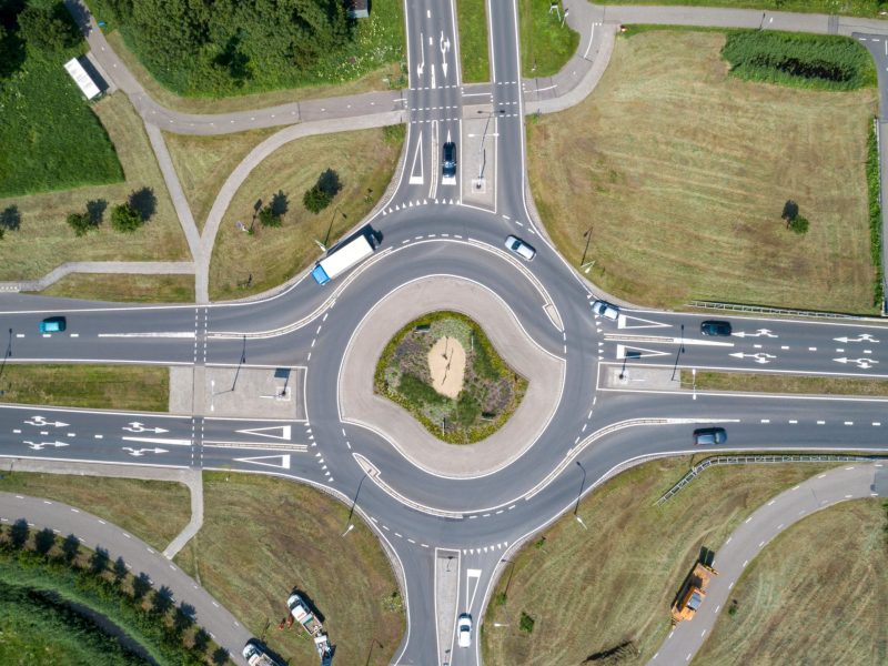 Top,Down,Aerial,View,Of,A,Traffic,Roundabout,On,A